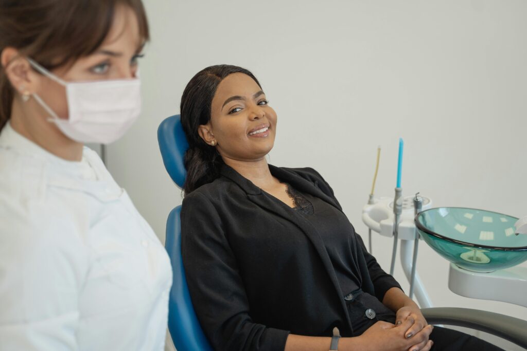 Patient receiving dental care at a clinic in San Diego, showcasing the importance of dental coverage in San Diego insurance benefit plans for employers.